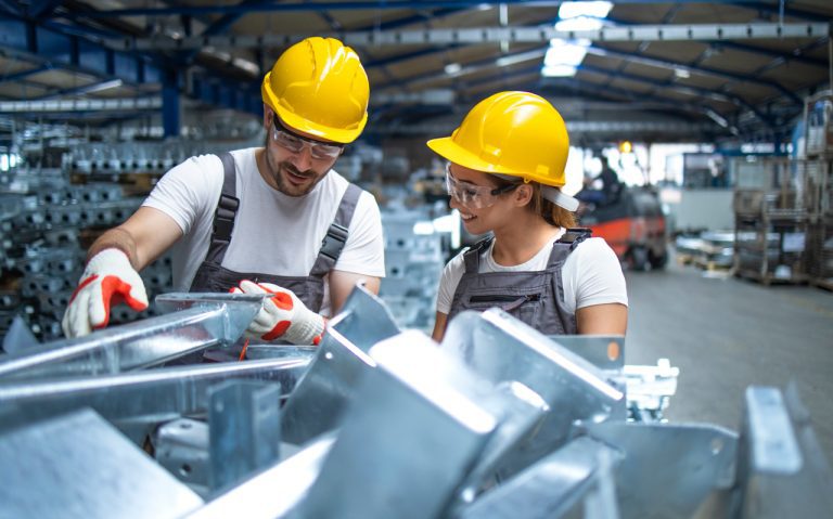 factory-workers-working-production-line 1